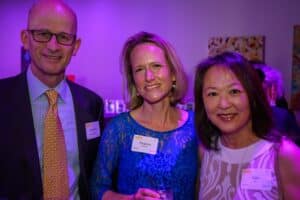 Jonathan Becker with his wife Virginia Watkins and their friend Julie Wu.